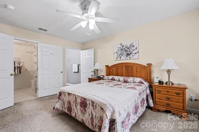 a bathroom with a sink a vanity and a toilet