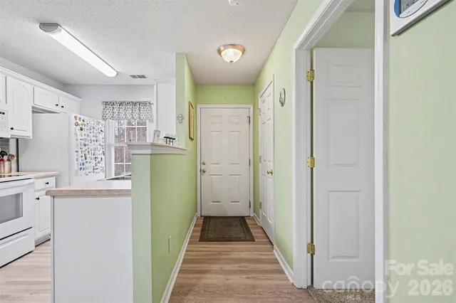 a kitchen that has a sink and a stove