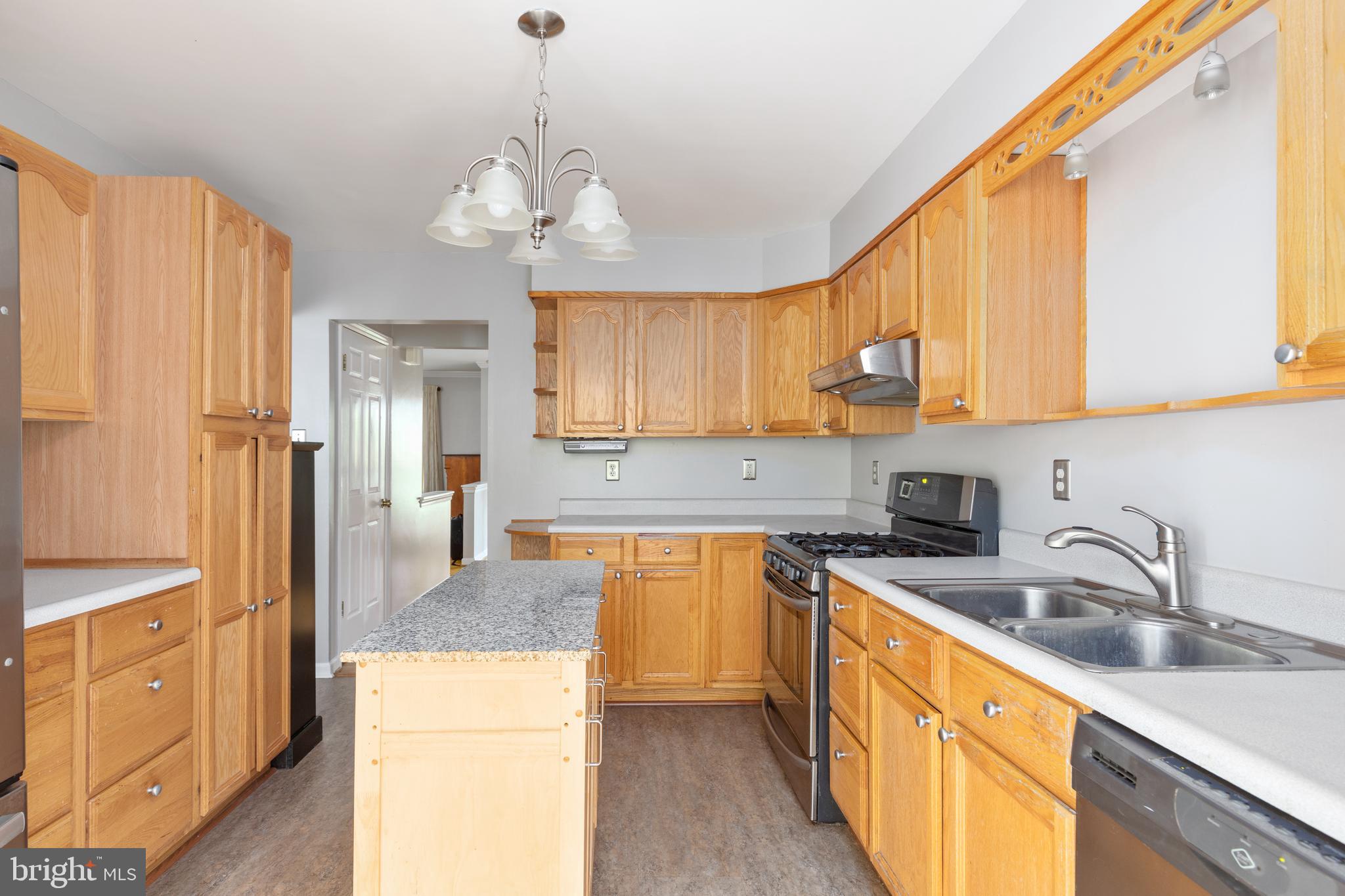 105 Forest Ridge Road Winchester, VA 22602 - Photo 17 of 32 Kitchen is open to the sun room