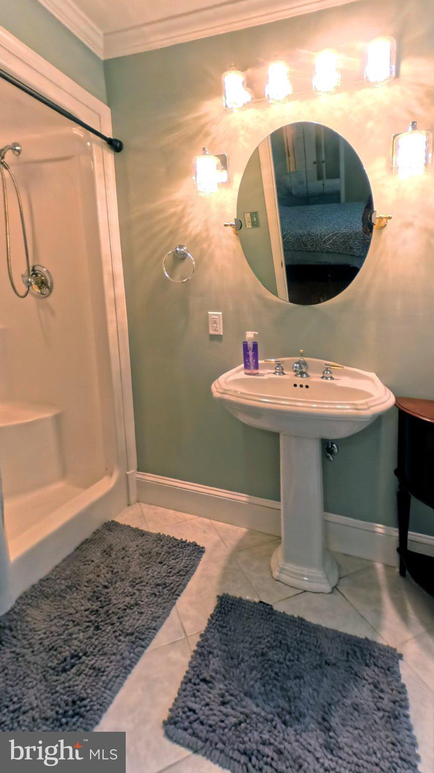 14705 Notley Road Silver Spring, MD 20905 - Photo 9 of 28 Charming bathroom with modern touches.