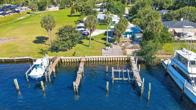 swimming pool view with a seating space