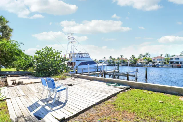 a view of a swimming pool with a lounge chairs