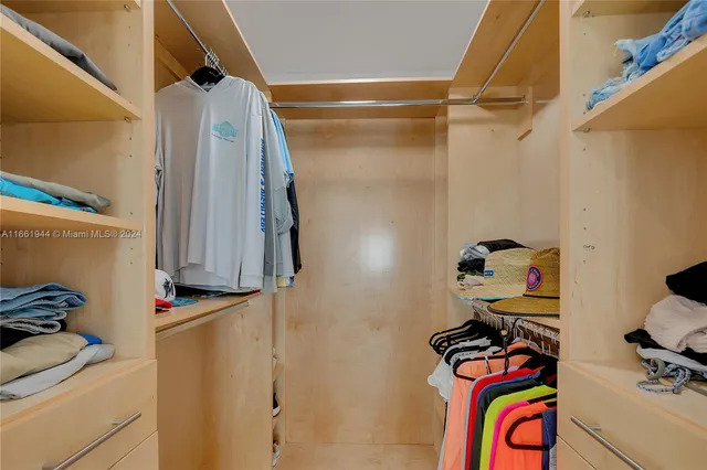 a bathroom with a shower sink and toilet