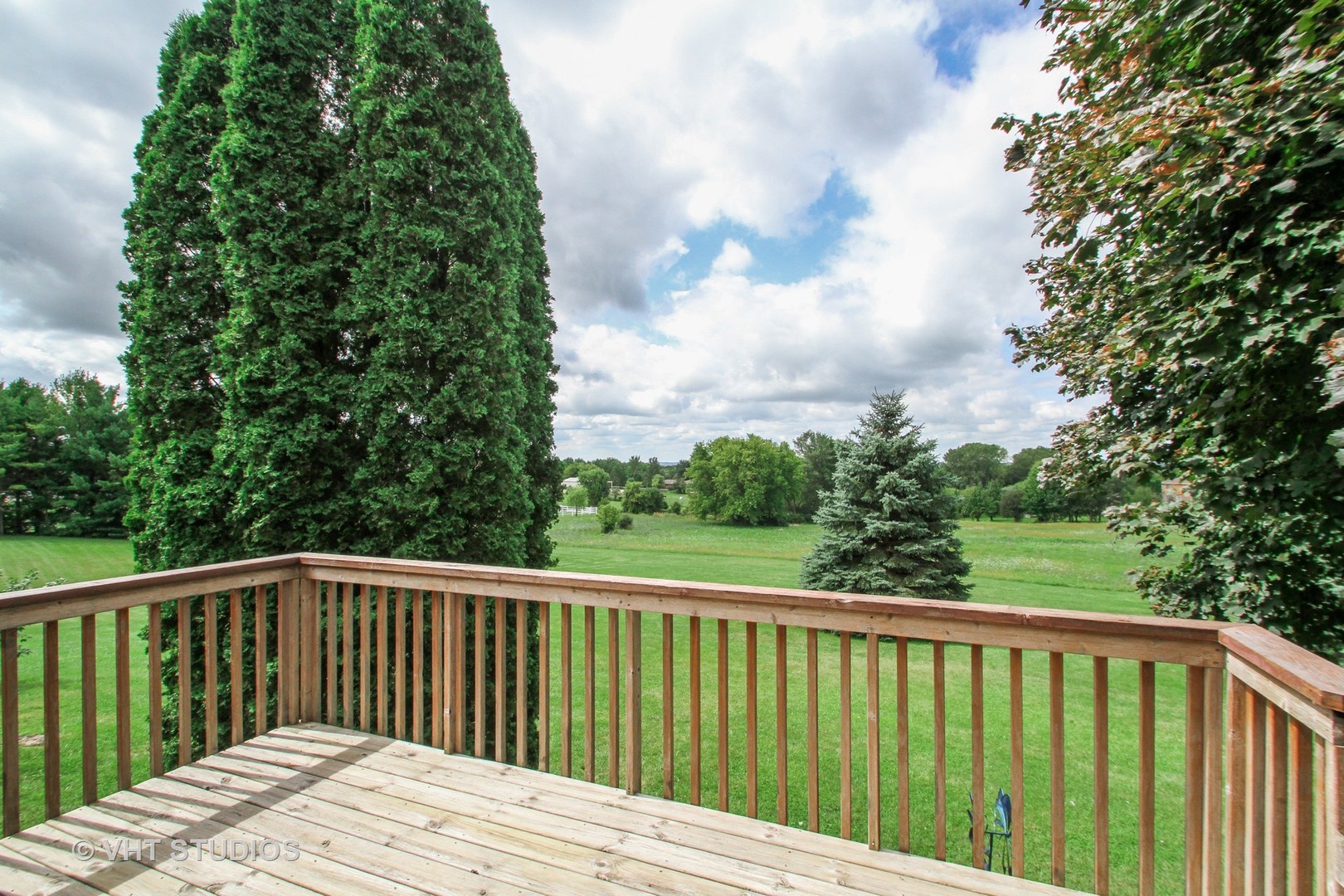 14008 Davis Road Woodstock, IL 60098 - Photo 19 of 32 a balcony with street view