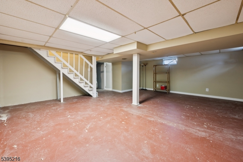 610 Lee Avenue Beverly, NJ 08010 - Photo 17 of 21 a view of an empty room with stairs