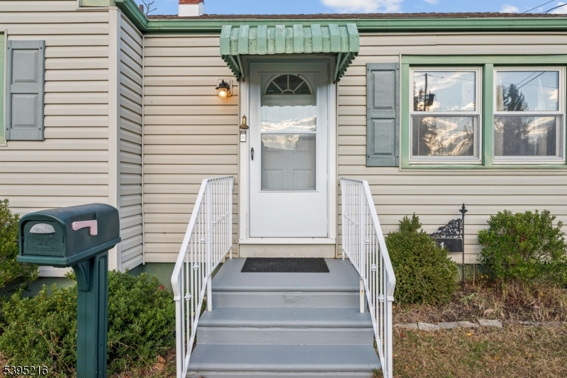 610 Lee Avenue Beverly, NJ 08010 - Photo 3 of 21 a view of a entrance of the house with a door