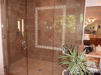 839 Rancho Road Thousand Oaks, CA 91362 - Photo 14 of 29 a bathroom with a shower