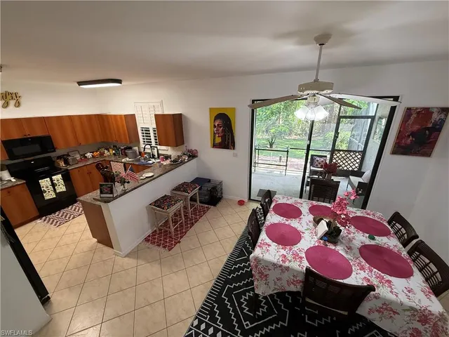 a bedroom with furniture and a flat screen tv