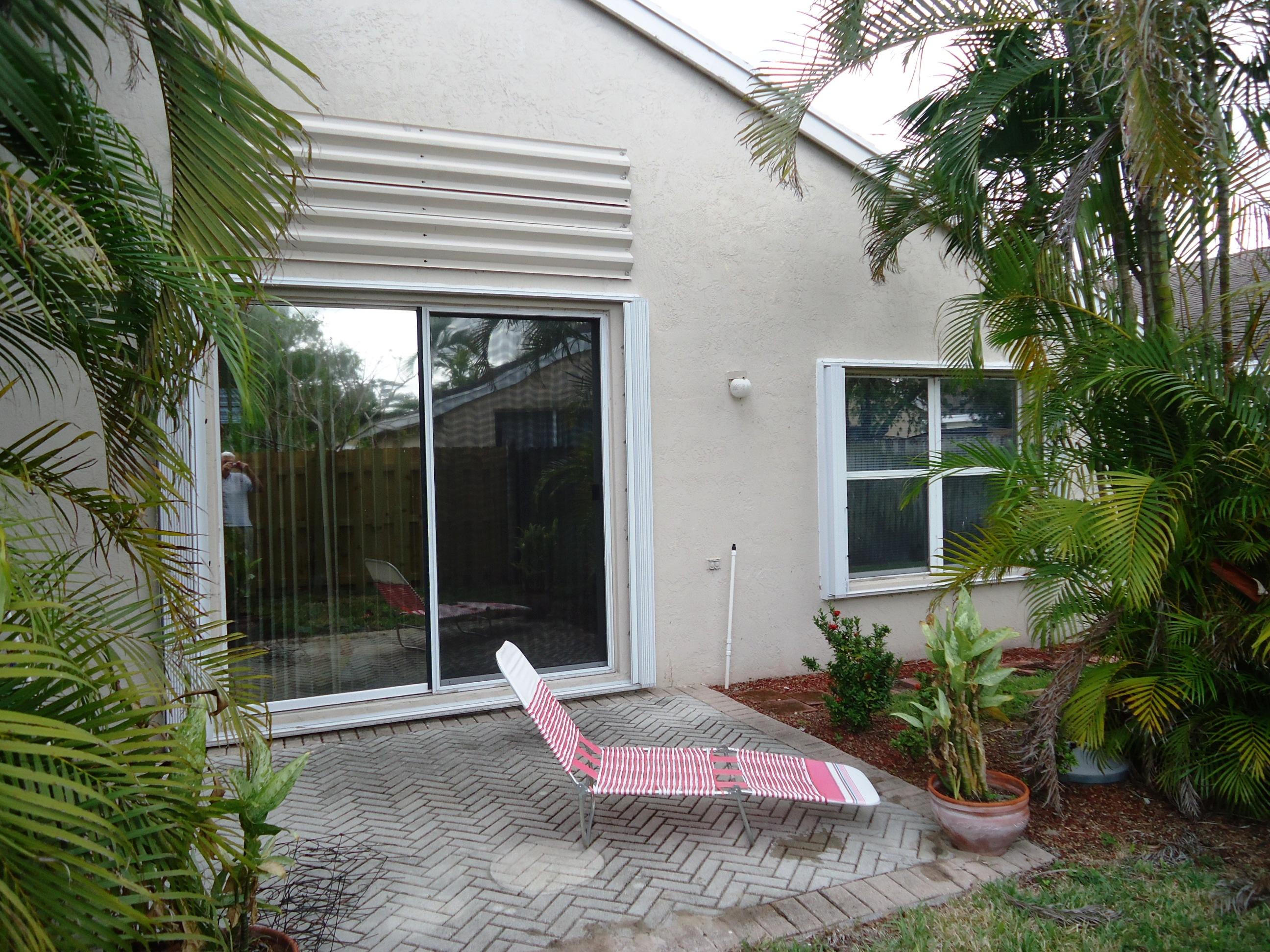 1826 Shadow Creek Road Greenacres, FL 33413 - Photo 3 of 15 BACK VIEW