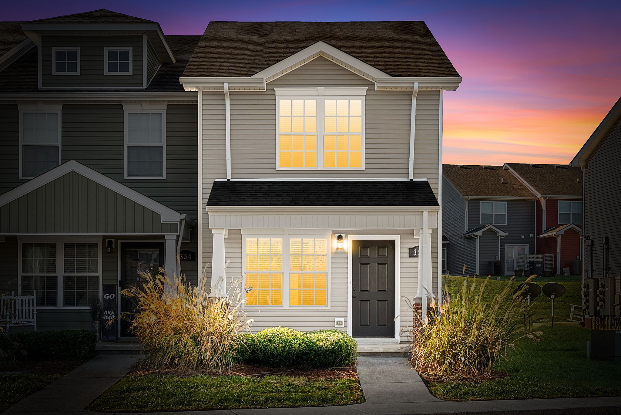 352 Sam Houston Circle Clarksville, TN 37040 - Photo 1 of 29 a front view of a house with garden