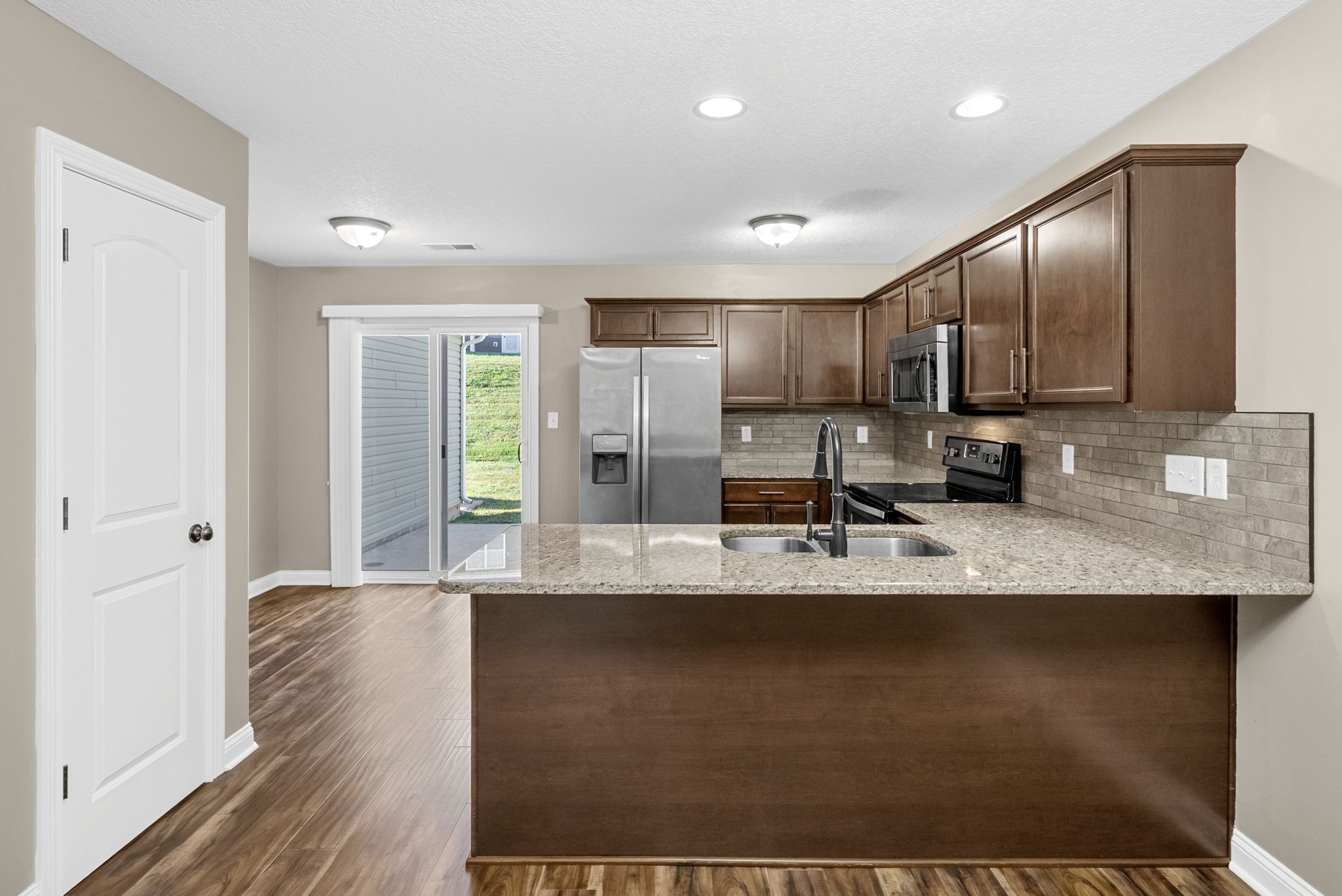 352 Sam Houston Circle Clarksville, TN 37040 - Photo 11 of 29 a view of a kitchen with granite countertop cabinets