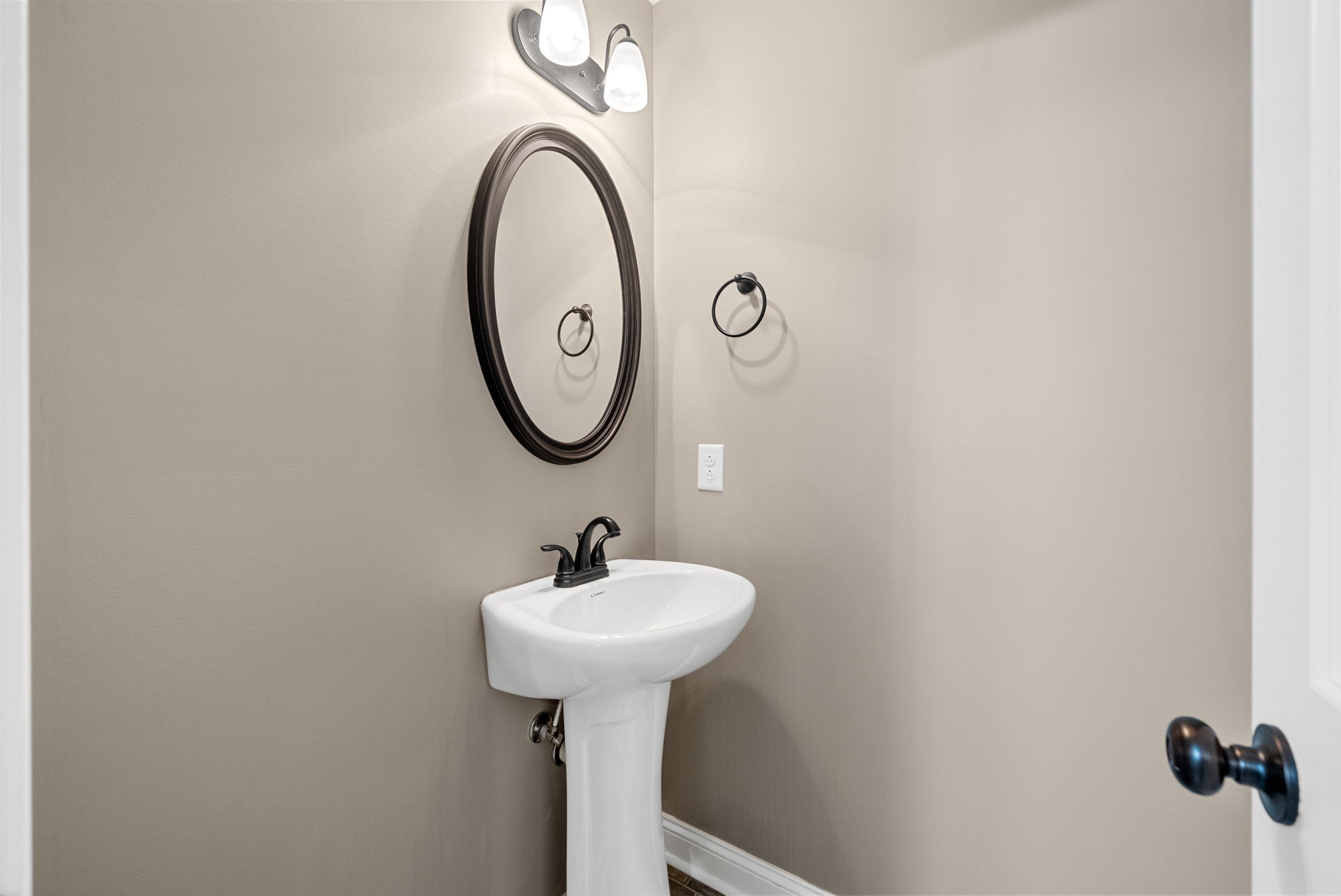 352 Sam Houston Circle Clarksville, TN 37040 - Photo 12 of 29 a bathroom with a sink and mirror