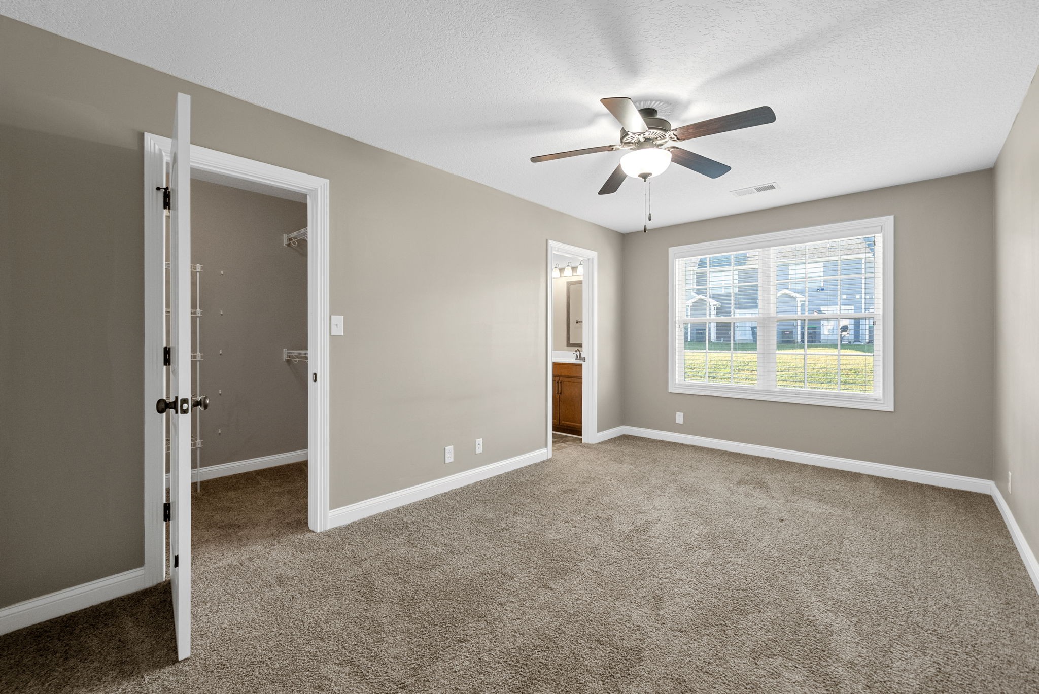 352 Sam Houston Circle Clarksville, TN 37040 - Photo 19 of 29 a view of an empty room with window and cabinet