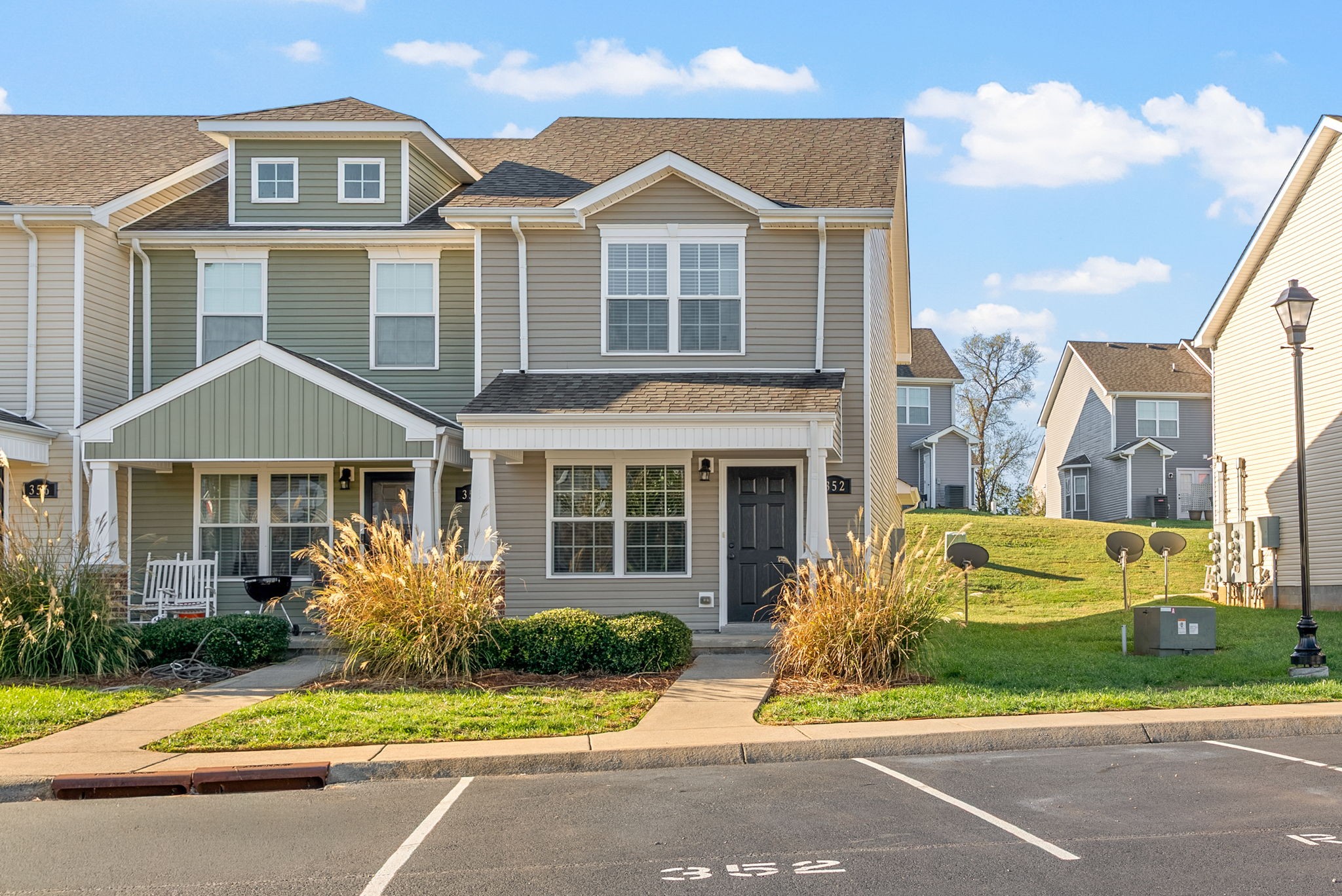 352 Sam Houston Circle Clarksville, TN 37040 - Photo 2 of 29 a front view of a house with a yard