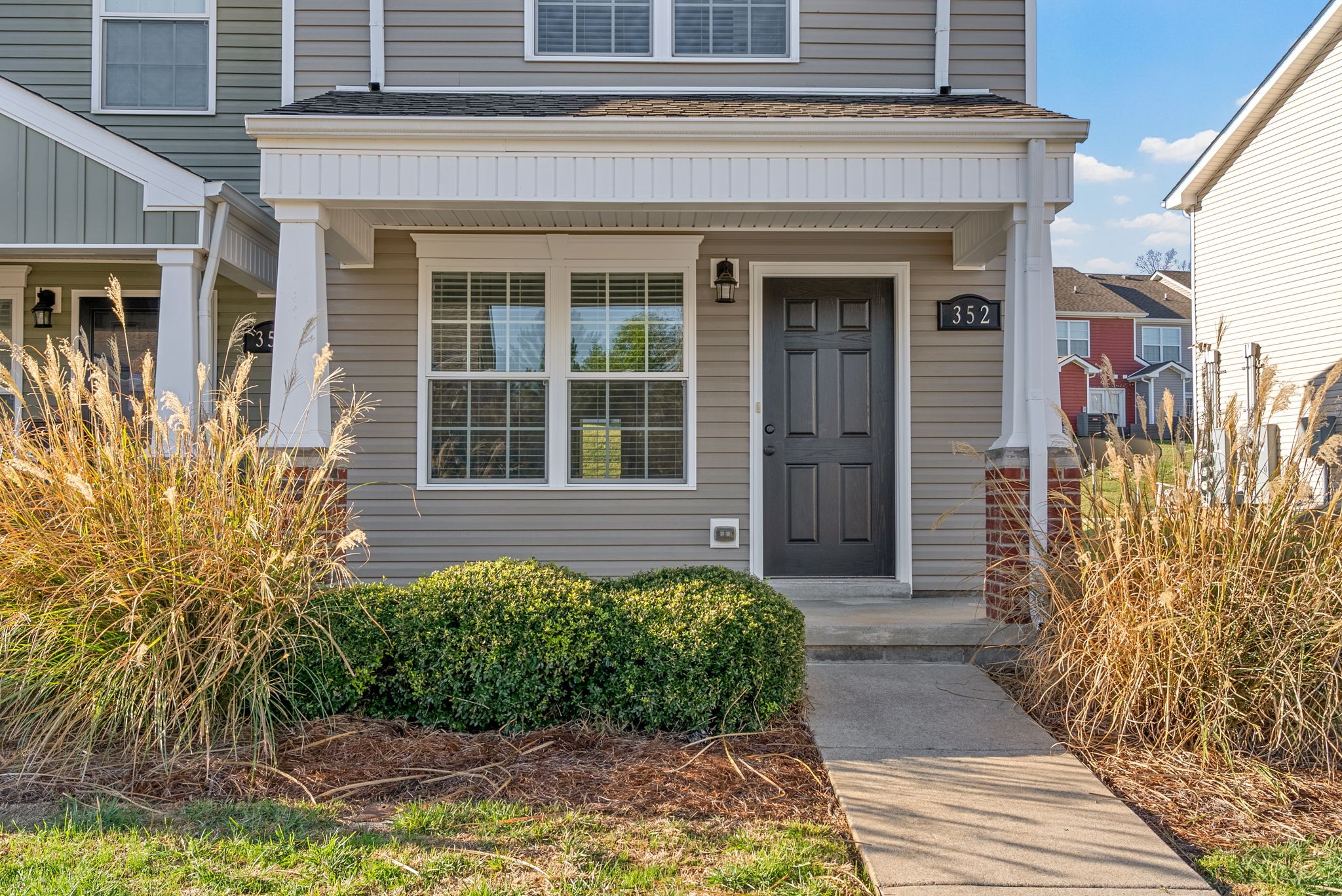 352 Sam Houston Circle Clarksville, TN 37040 - Photo 3 of 29 a front view of a house with a yard