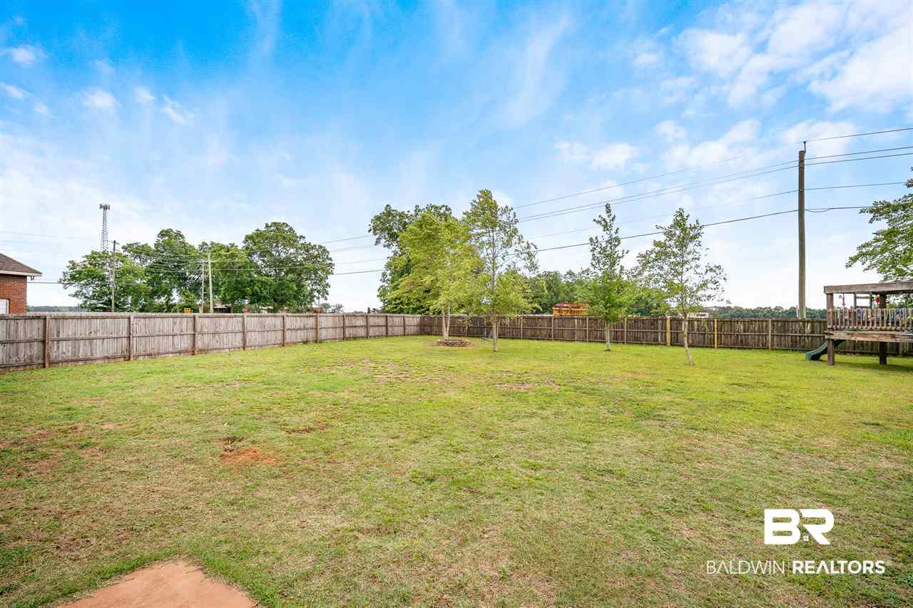 10921 Roanoke Loop Daphne, AL 36526 - Photo 23 of 31 Fenced Backyard