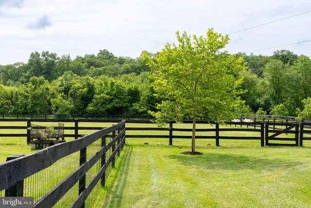 a view of a glass door of the house