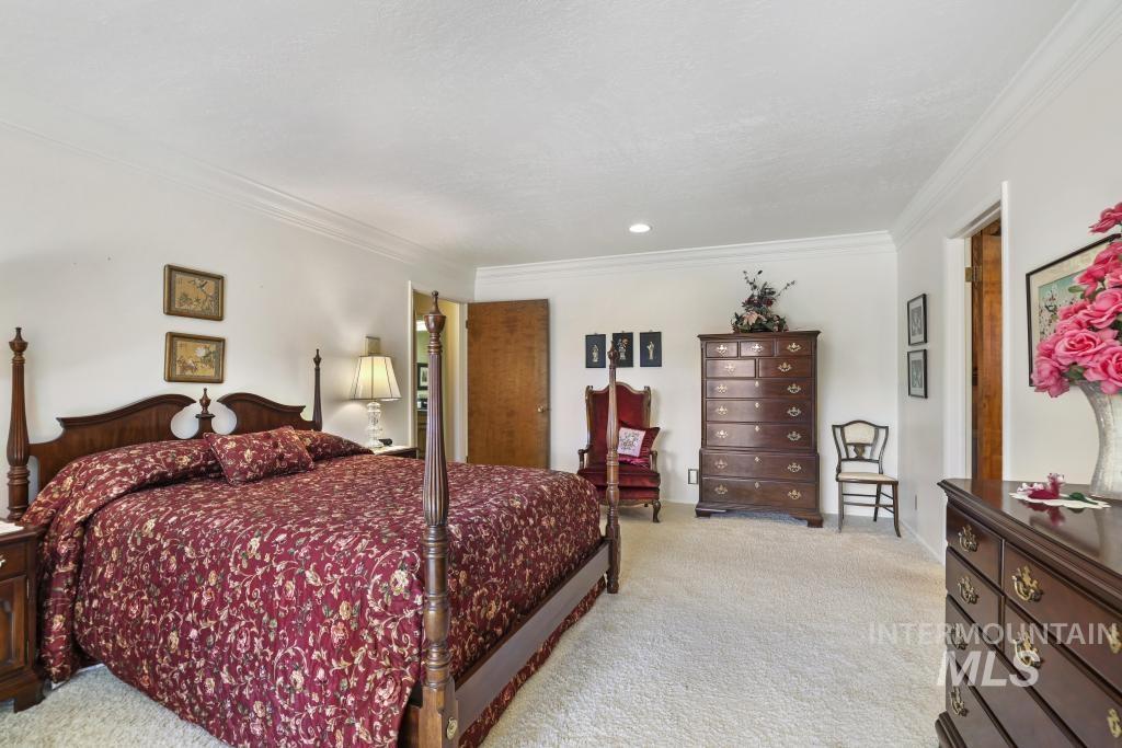2018 Rancho Vista Drive Twin Falls, ID 83301 - Photo 21 of 50 Spacious room featuring neutral wall tones, crown molding, recessed lighting, and light-toned carpeting