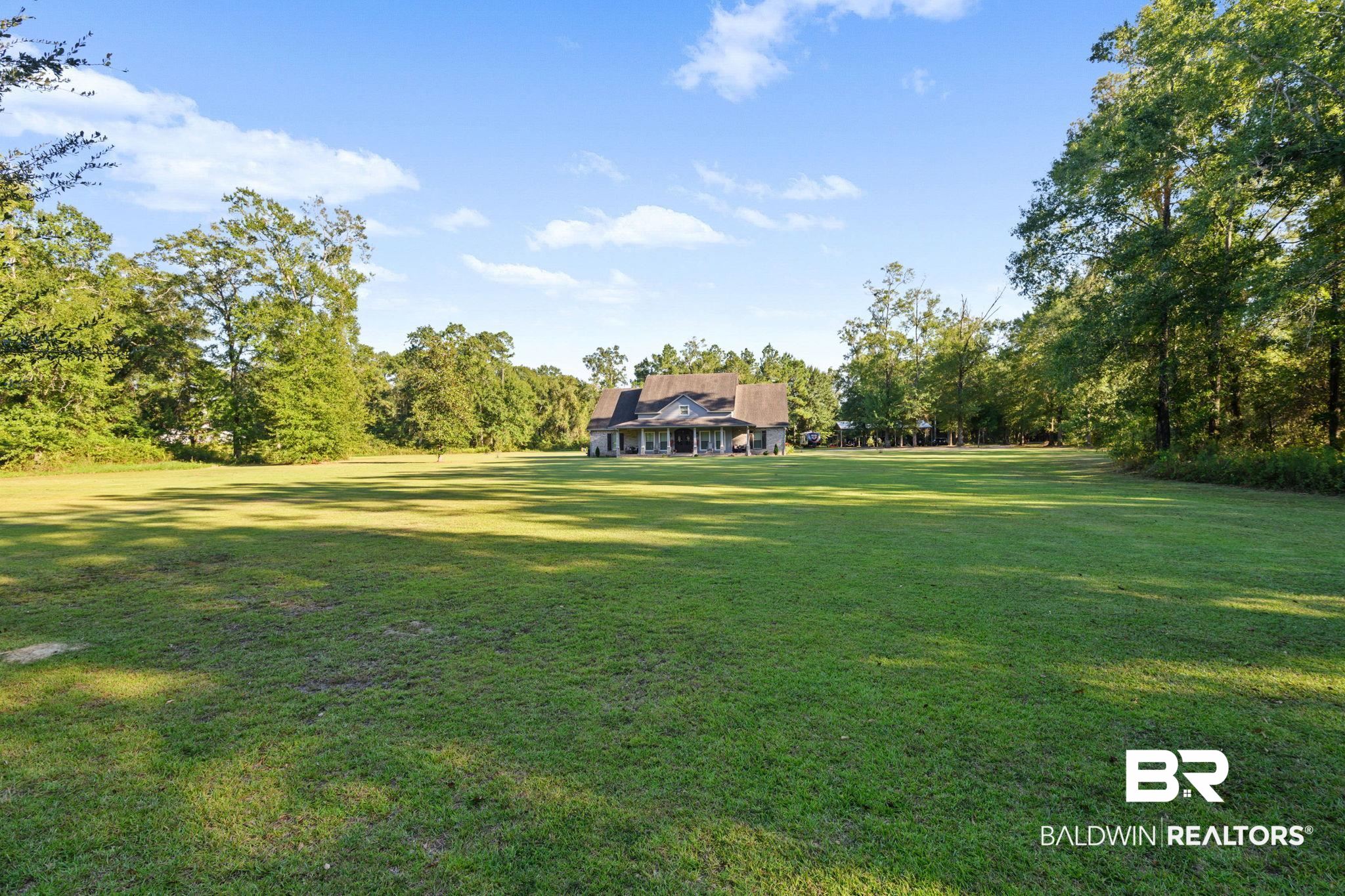 52579 Stockton Cemetery Road Stockton, AL 36507 - Photo 63 of 66 View of grassy yard featuring a porch