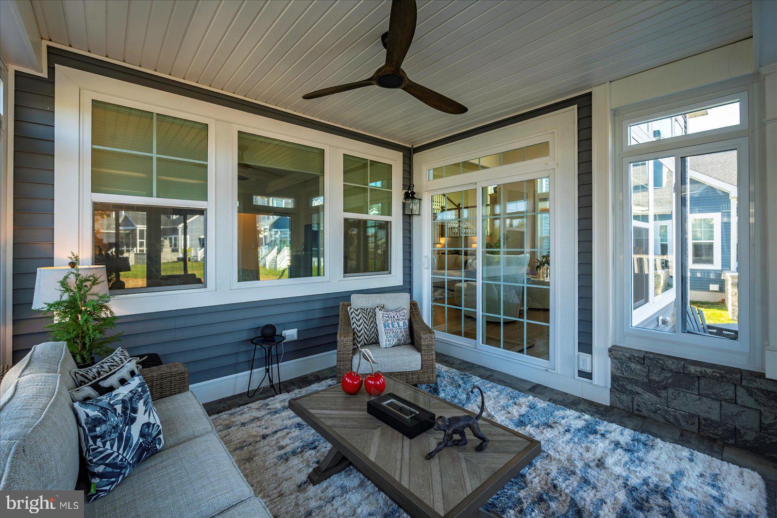 19218 American Holly Road Rehoboth Beach, DE 19971 - Photo 23 of 107 1st floor 3 season room