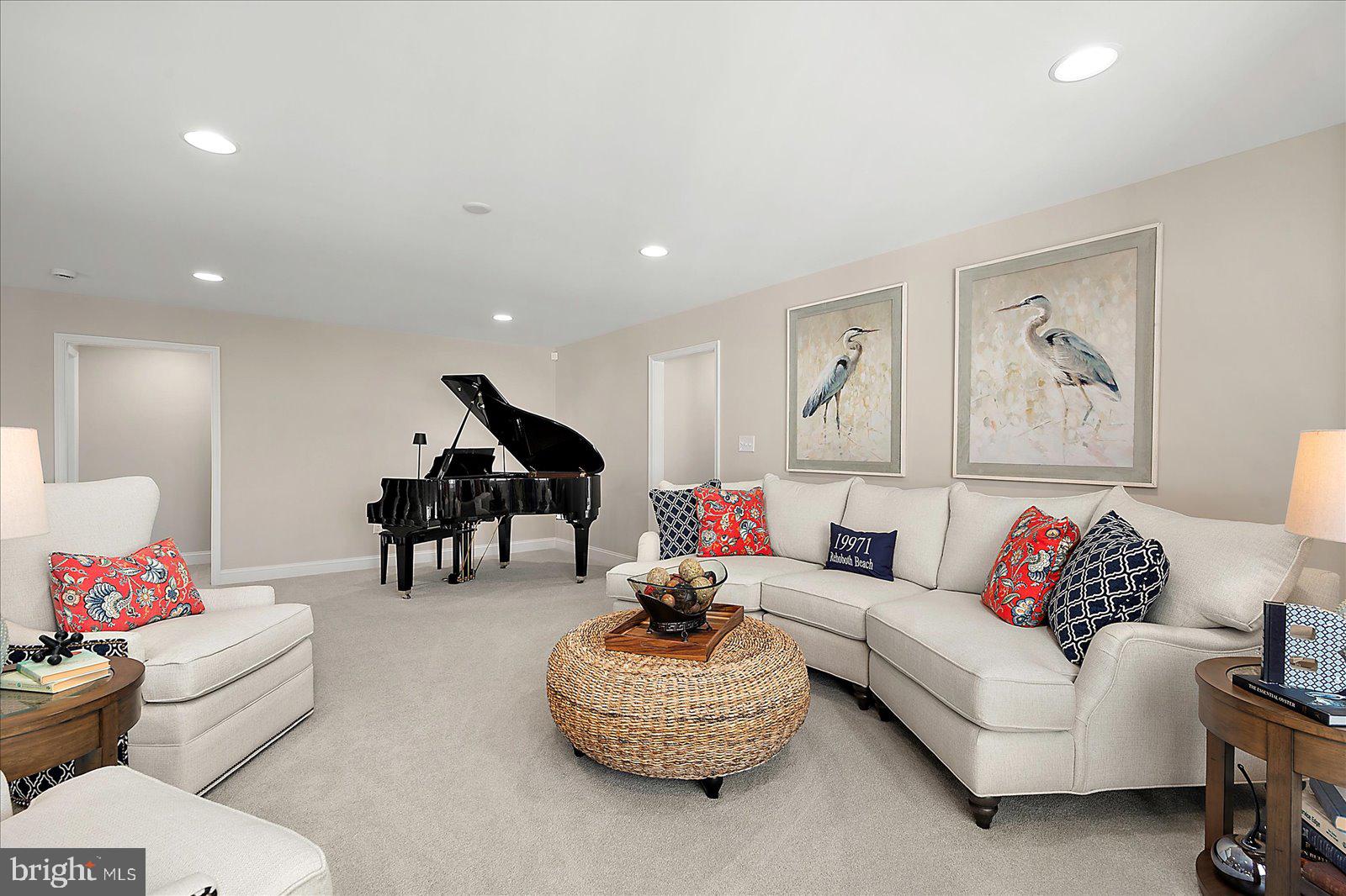 19218 American Holly Road Rehoboth Beach, DE 19971 - Photo 43 of 107 a living room with furniture and a couch