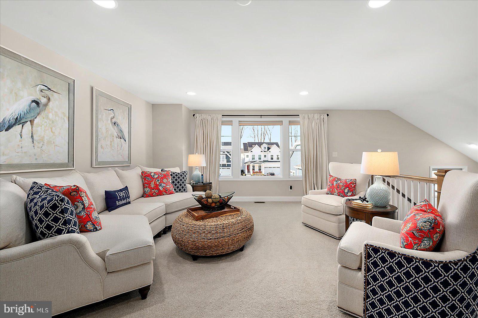 19218 American Holly Road Rehoboth Beach, DE 19971 - Photo 48 of 107 a living room with furniture and a couch