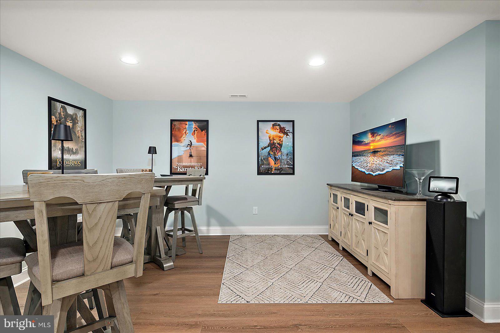 19218 American Holly Road Rehoboth Beach, DE 19971 - Photo 71 of 107 a view of a livingroom with furniture and a flat screen tv