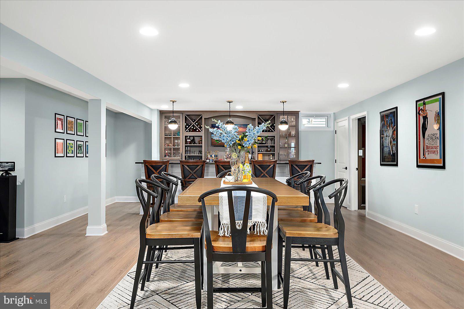19218 American Holly Road Rehoboth Beach, DE 19971 - Photo 78 of 107 a view of a dining room with furniture and wooden floor