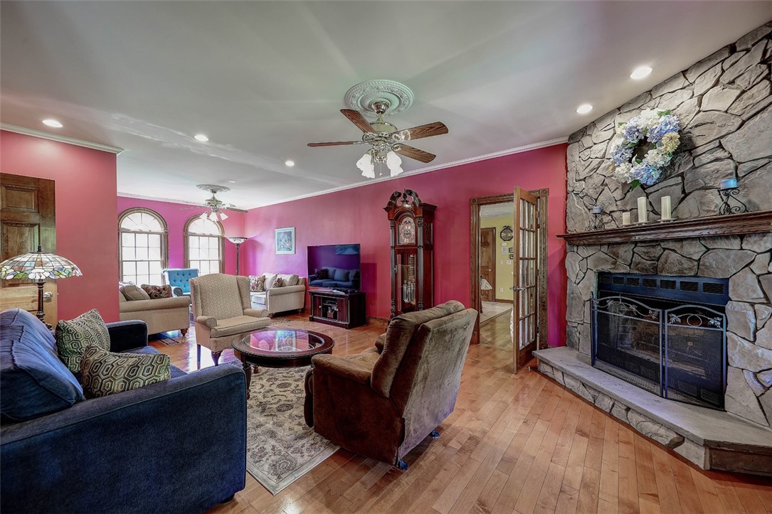 55 Paine Road Cumberland, RI 02864 - Photo 10 of 45 Living/family room with stone firelplace