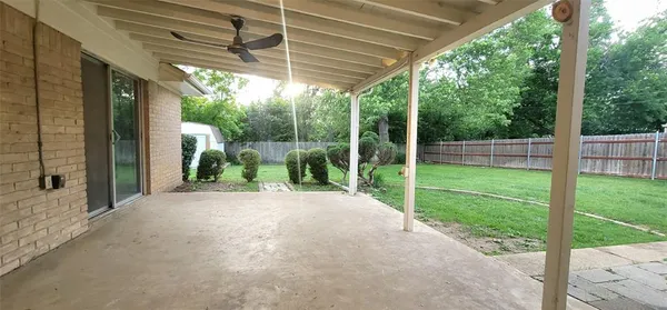 a view of a porch with a backyard
