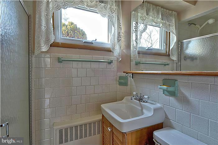 805 Crest Hill Road Severn, MD 21061 - Photo 16 of 20 Bath on the lower level has stall shower.