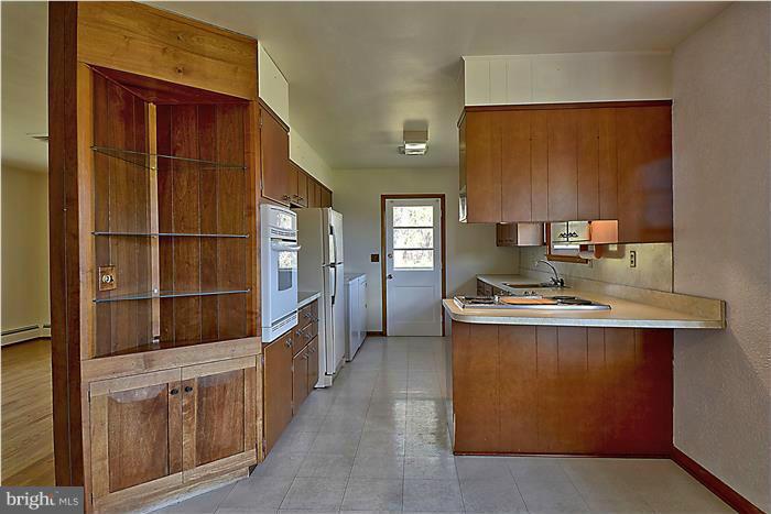 805 Crest Hill Road Severn, MD 21061 - Photo 8 of 20 Lots of cabinetry.