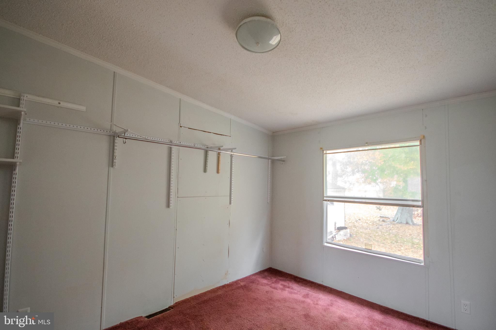 3887 Texas Road Bivalve, MD 21814 - Photo 19 of 34 an empty room with windows