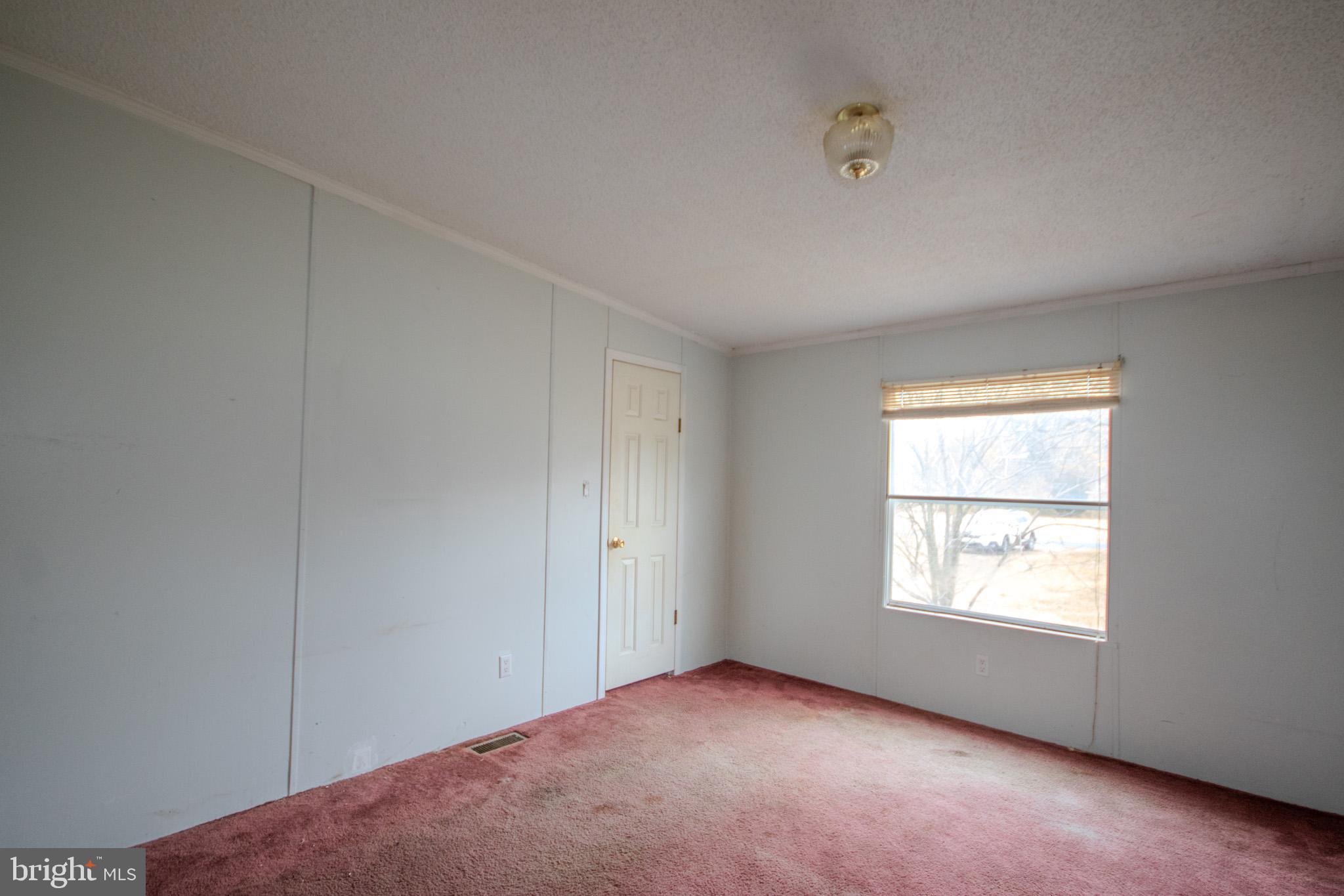 3887 Texas Road Bivalve, MD 21814 - Photo 20 of 34 an empty room with a window