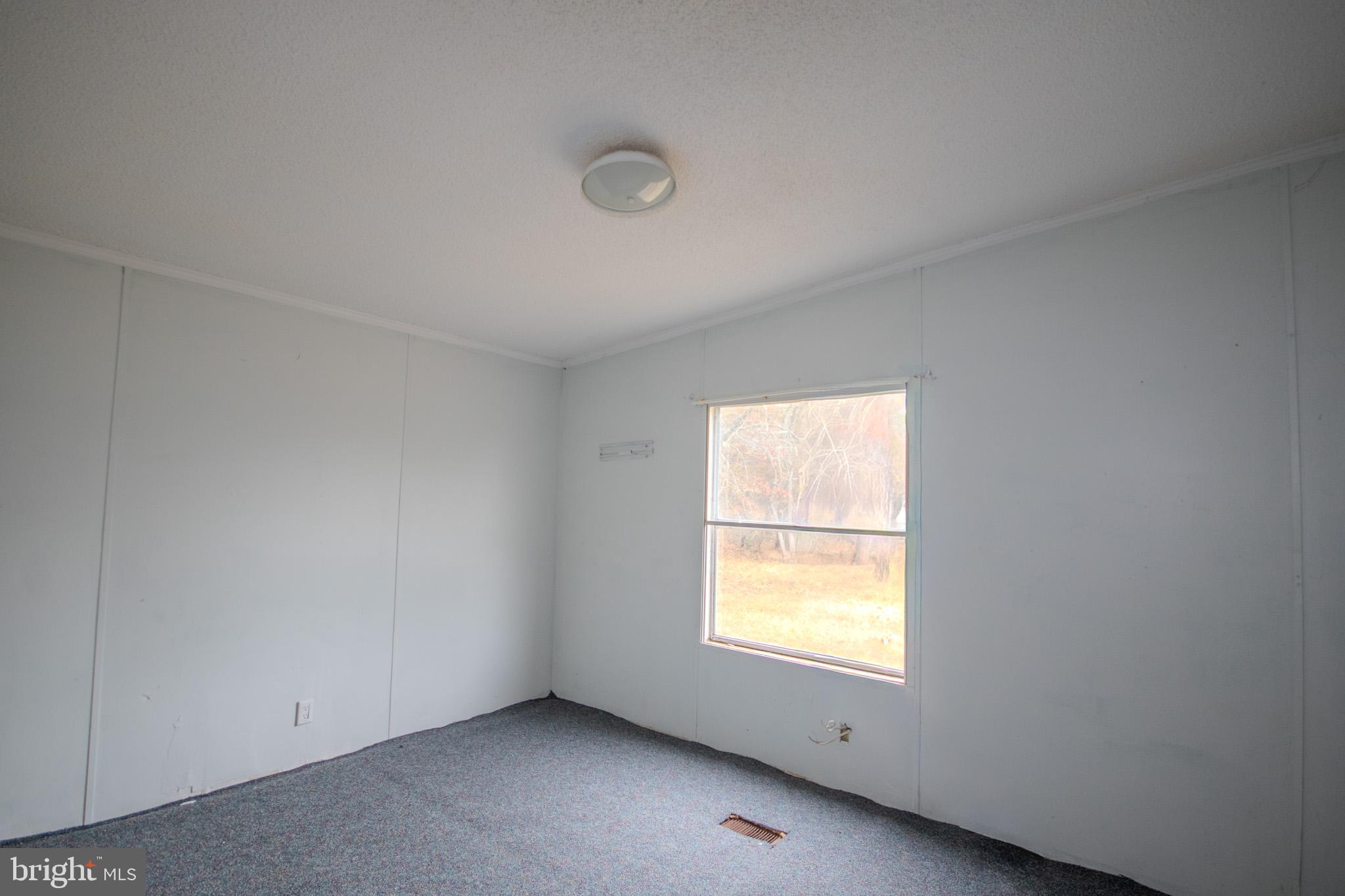 3887 Texas Road Bivalve, MD 21814 - Photo 23 of 34 an empty room with a window