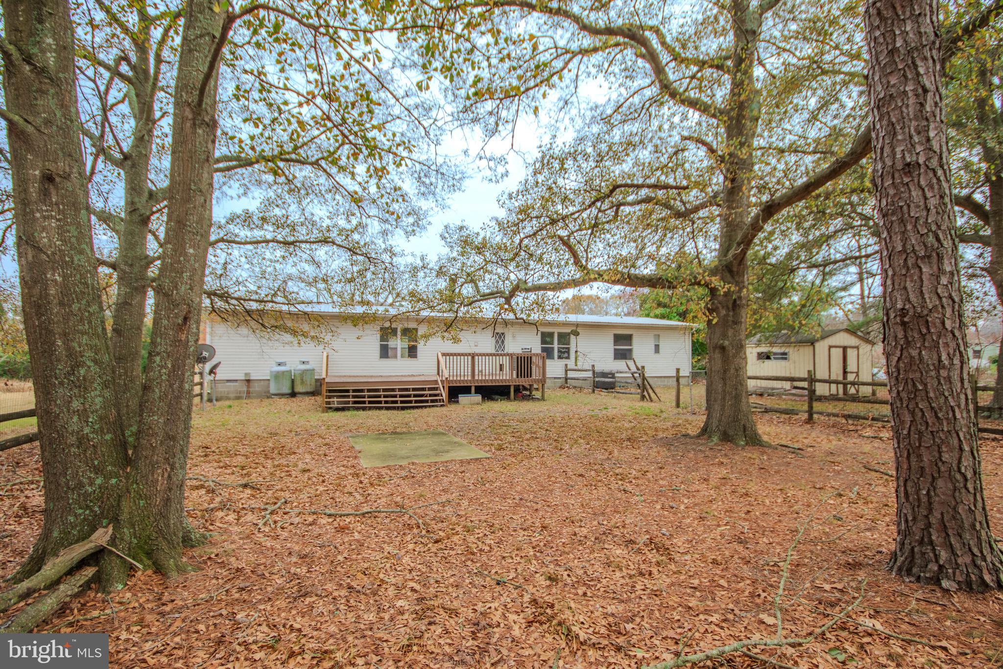 3887 Texas Road Bivalve, MD 21814 - Photo 33 of 34 a view of a house with a yard covered in snow