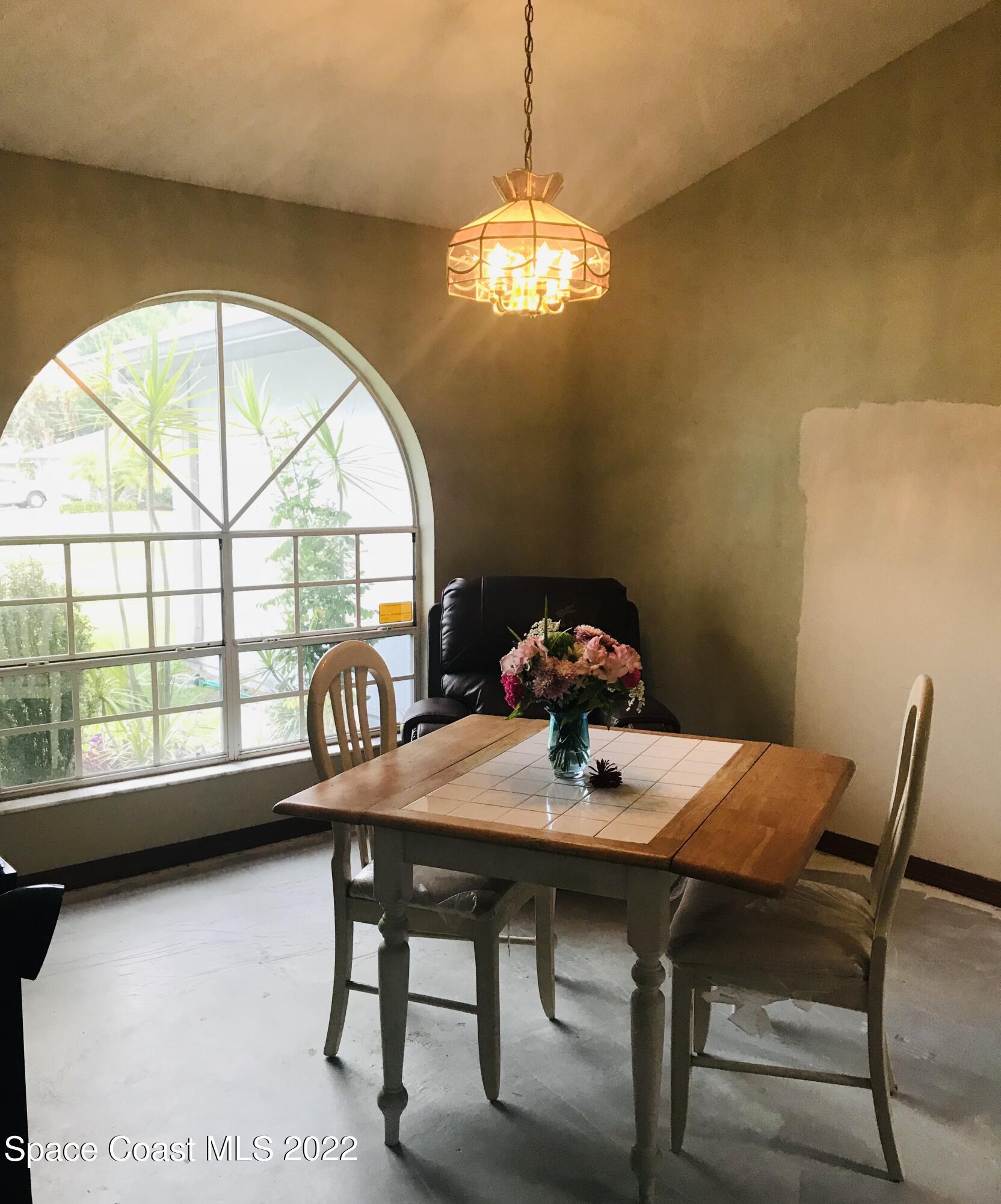 200 Southeast Rios Court Palm Bay, FL 32909 - Photo 2 of 18 front room/dining or office