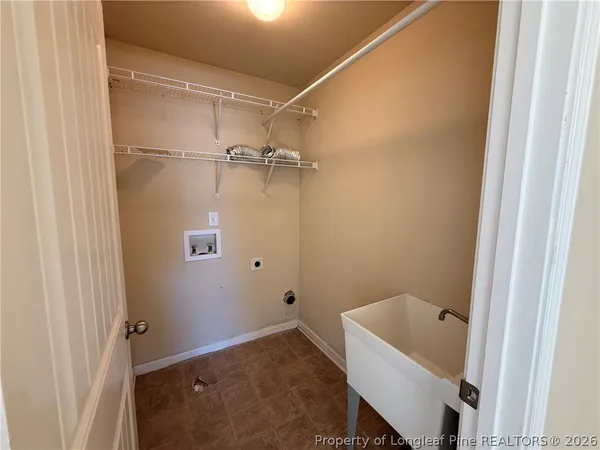 a bathroom with a tub and shower