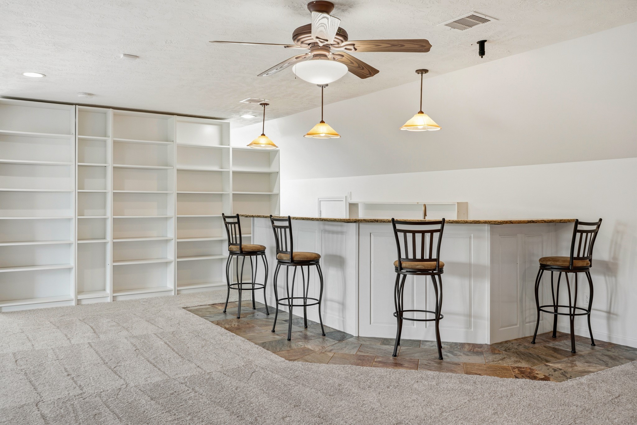 41712 Harpers Church Road Hempstead, TX 77445 - Photo 37 of 50 Massive Game room space w/sit-up bar w/granite countertops, shelving