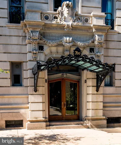 a view of a chandelier with sitting area