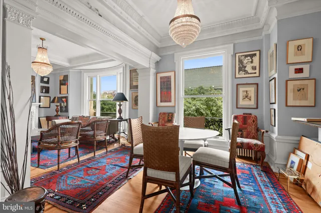 a view of a dining room with furniture
