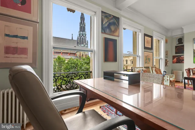 a view of a dining room with furniture window and outside view