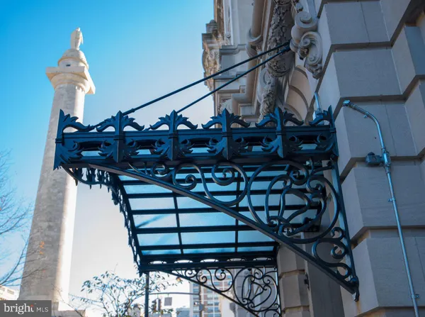 a view of a hallway with entryway door