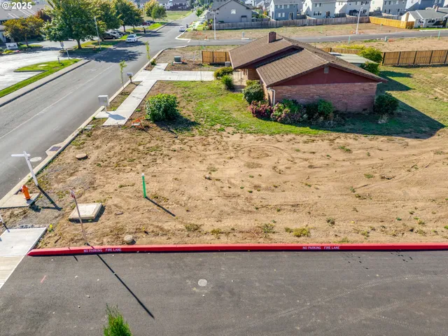 a view of a swimming pool and an outdoor space