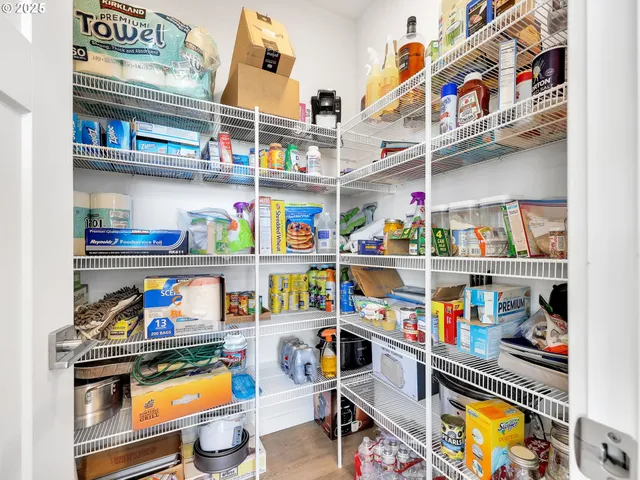 a store room with lots of clutter and storage