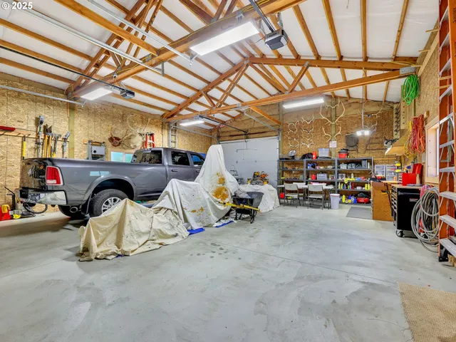 a view of parking garage with cars