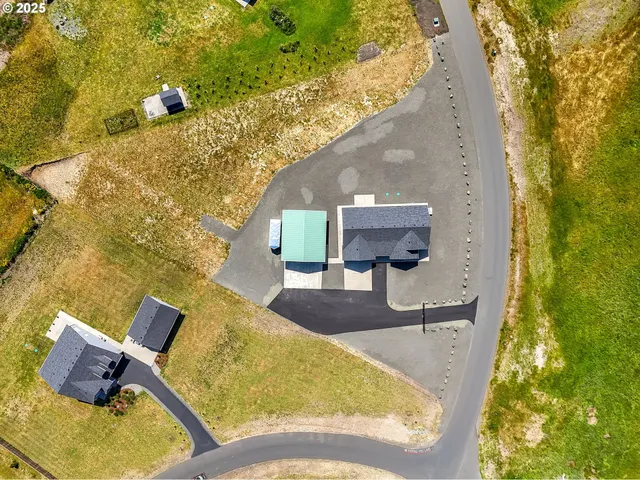 a view of swimming pool from a balcony