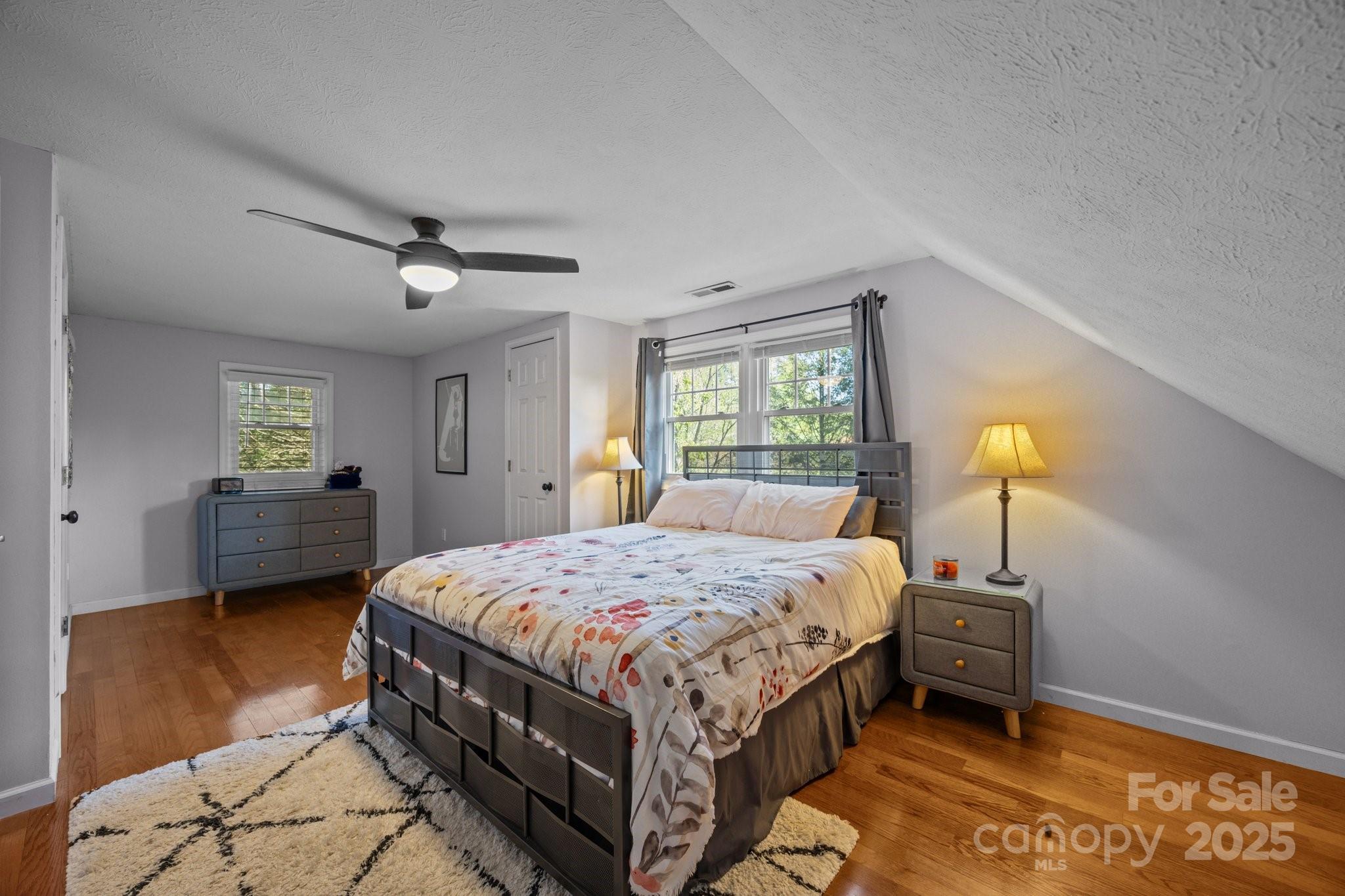 25 Alpine Way Clyde, NC 28721 - Photo 16 of 23 a bedroom with a bed and a window