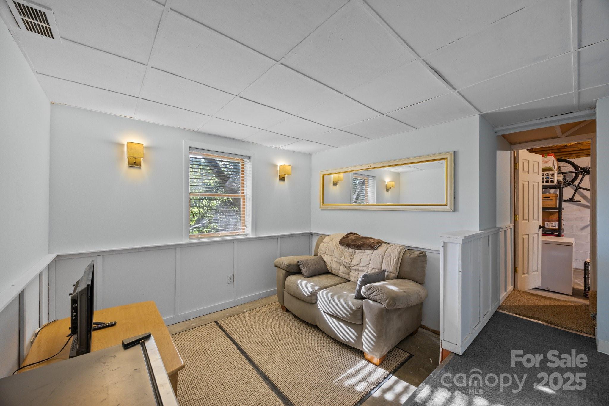 25 Alpine Way Clyde, NC 28721 - Photo 19 of 23 a living room with furniture and a window