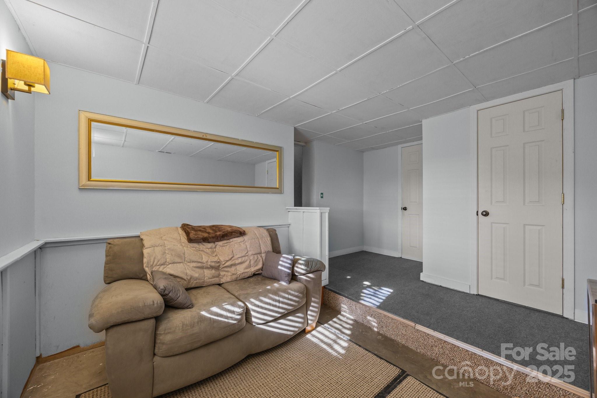 25 Alpine Way Clyde, NC 28721 - Photo 20 of 23 a living room with furniture and a rug